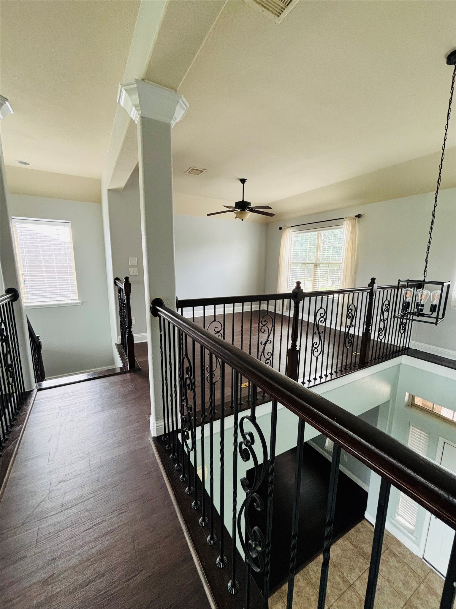419 Blossom Terrace Lane Rosenberg, TX 77469 - Photo 8 of 19 a view of a hallway with wooden floor and stairs
