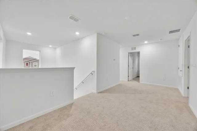 a view of a kitchen with a sink