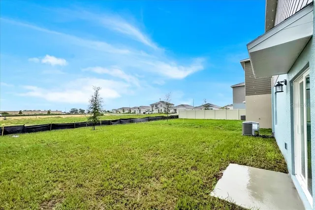 a view of a lake from a yard