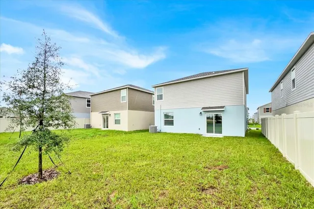 a house with trees in front of it
