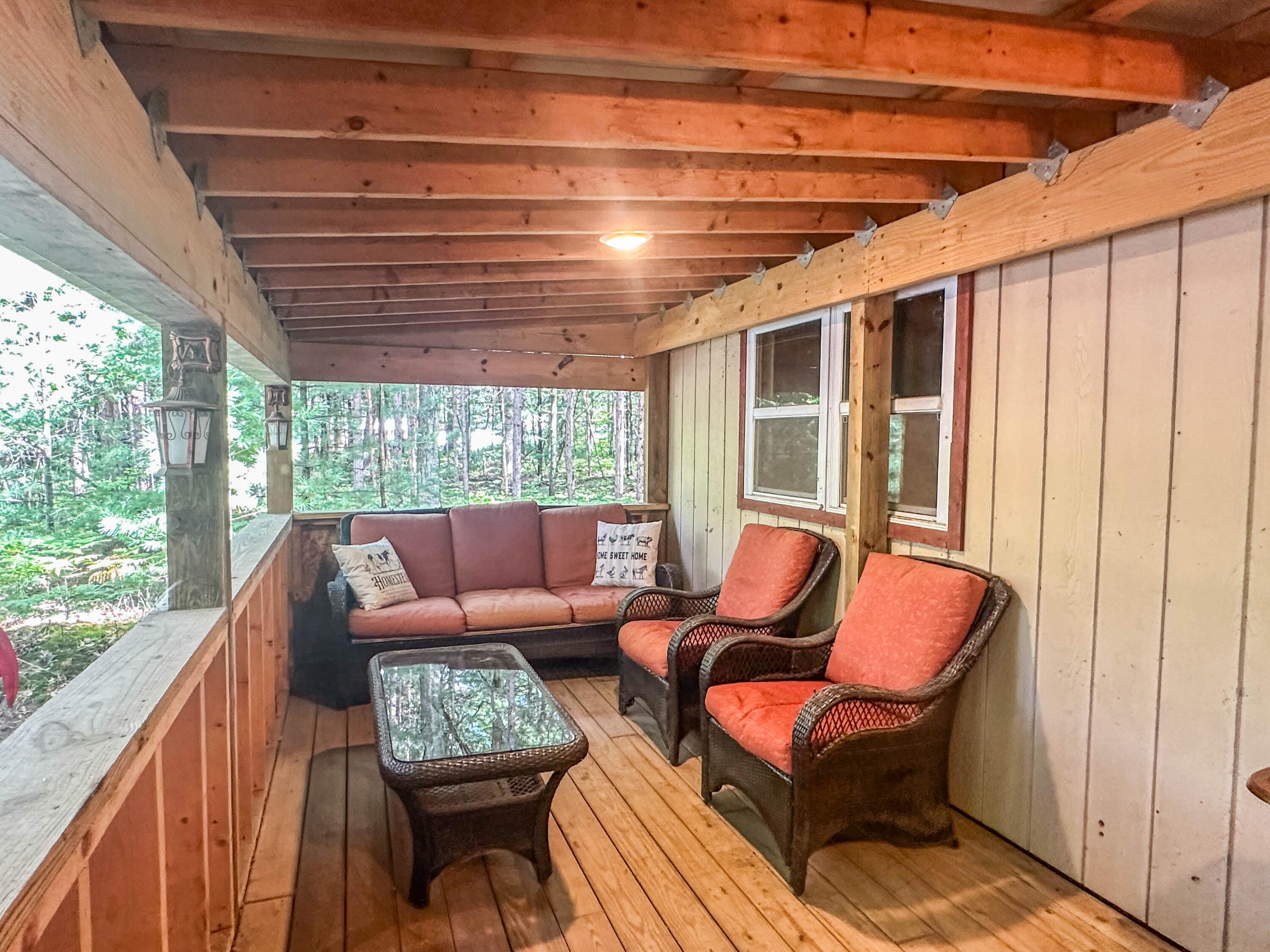 10450 North Tuttle Road Free Soil, MI 49411 - Photo 9 of 35 Porch Seating Area