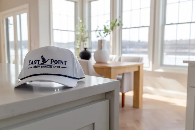 a view of a kitchen with a large window