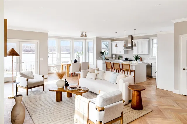 a living room with furniture and a table