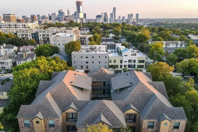 a city view with tall buildings
