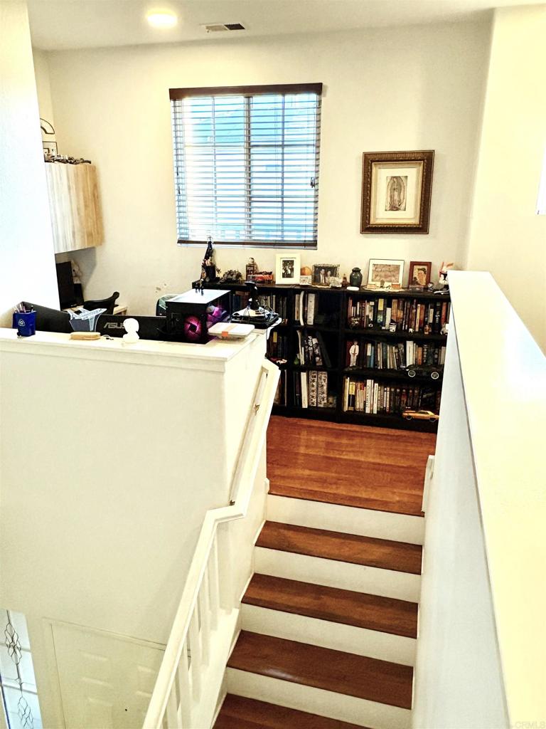 2879 Bear Valley Road Chula Vista, CA 91915 - Photo 24 of 61 a living room with furniture and wooden floor