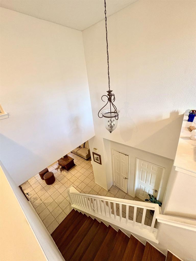 2879 Bear Valley Road Chula Vista, CA 91915 - Photo 26 of 61 a view of a hardwood floor and a table in a living room