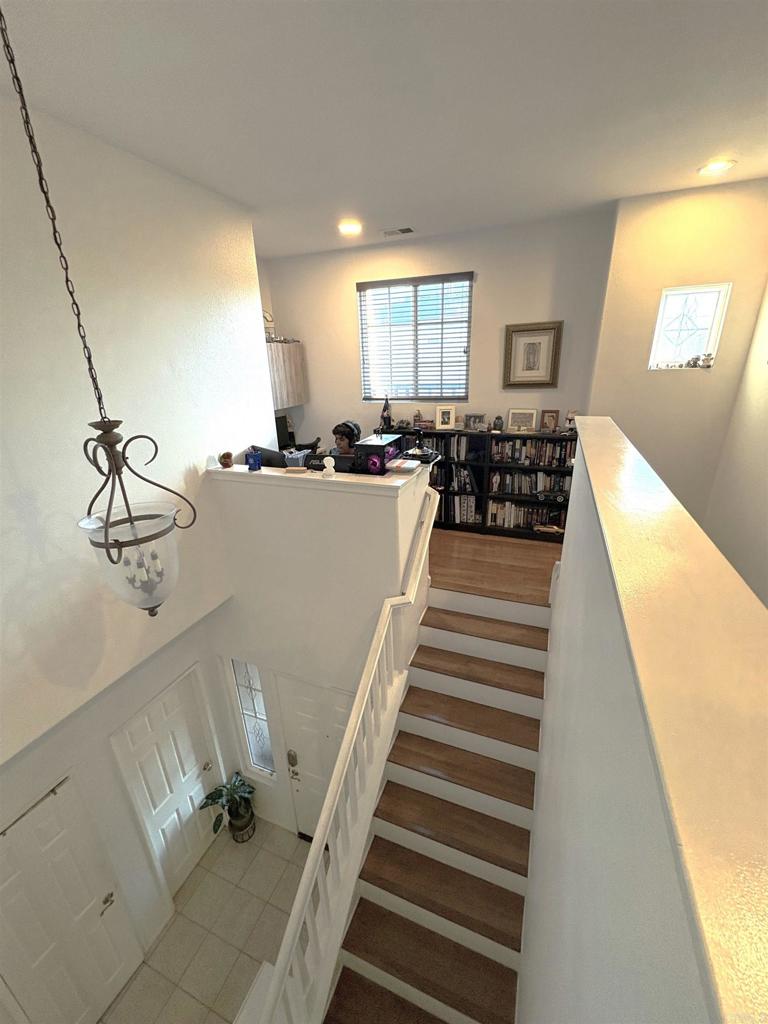 2879 Bear Valley Road Chula Vista, CA 91915 - Photo 27 of 61 a view of a livingroom with furniture and staircase