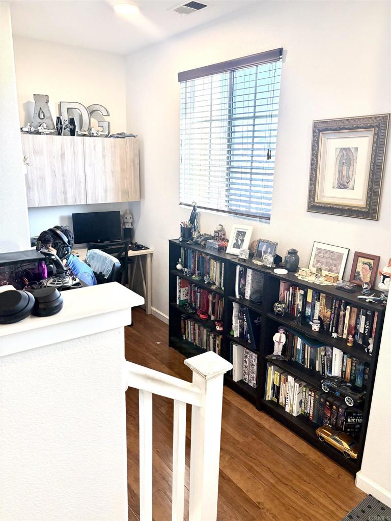 2879 Bear Valley Road Chula Vista, CA 91915 - Photo 29 of 61 a kitchen view of a dining table chairs and entryway