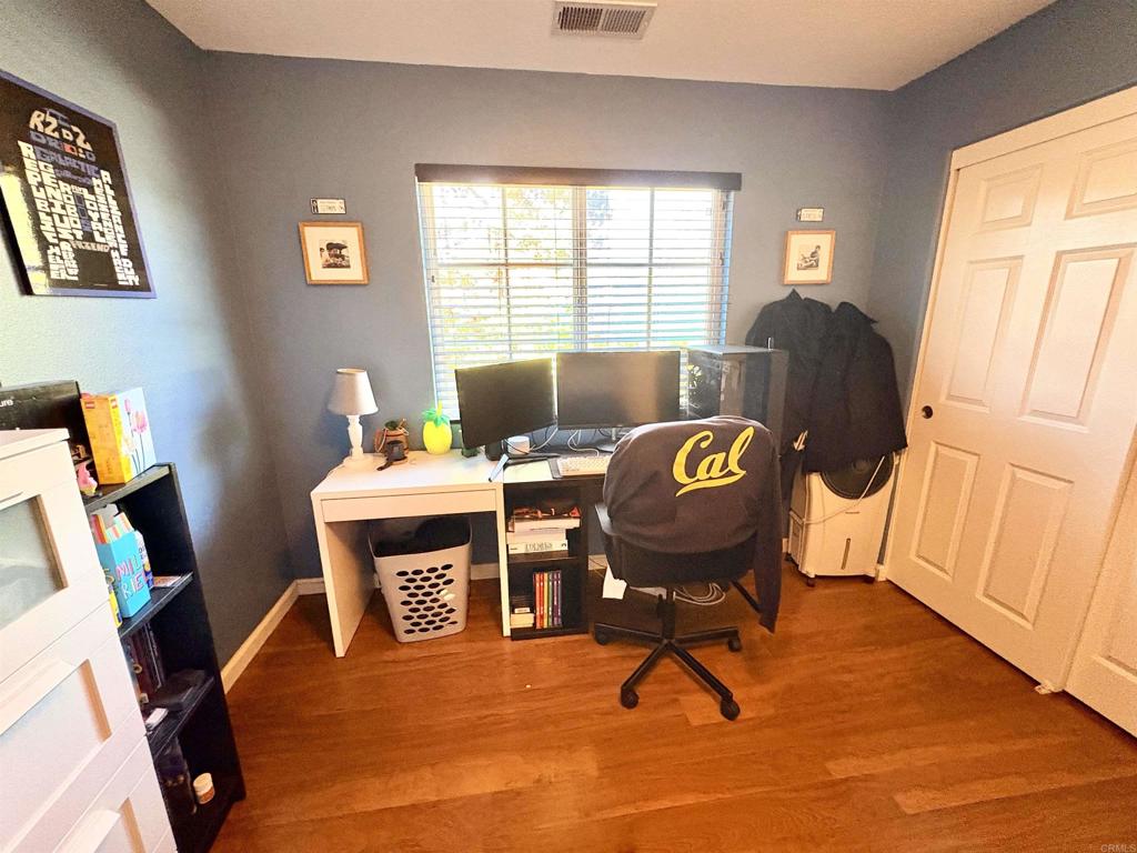 2879 Bear Valley Road Chula Vista, CA 91915 - Photo 38 of 61 a living room with furniture and a window