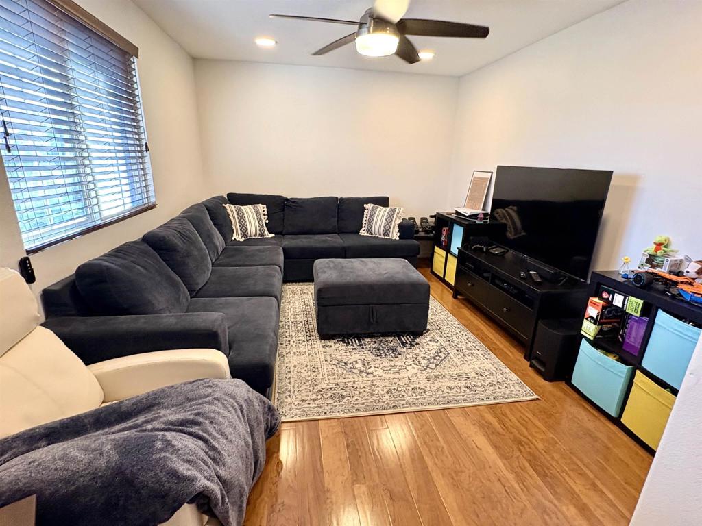 2879 Bear Valley Road Chula Vista, CA 91915 - Photo 51 of 61 a living room with furniture and a flat screen tv