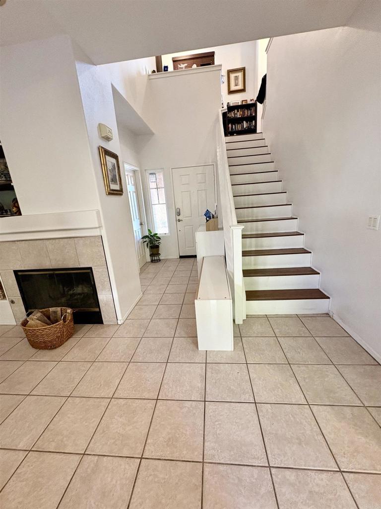 2879 Bear Valley Road Chula Vista, CA 91915 - Photo 61 of 61 a view of a livingroom with white cabinets and stairs