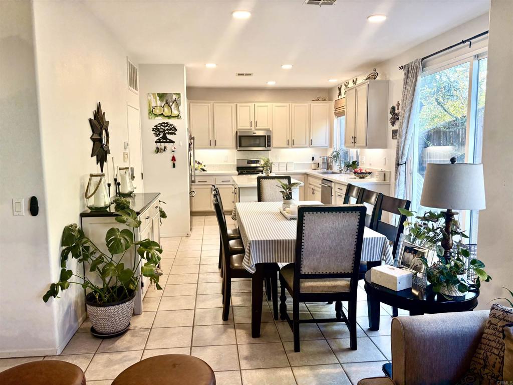 2879 Bear Valley Road Chula Vista, CA 91915 - Photo 8 of 61 a view of a dining room with furniture window and outside view