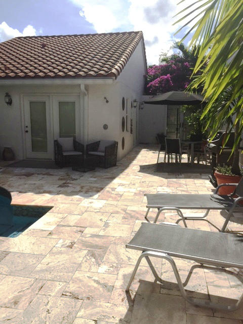3877 Candlewood Boulevard Boca Raton, FL 33487 - Photo 3 of 18 COURTYARD/PATIO AREA