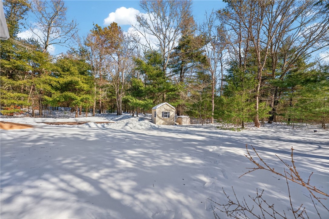 144 Richmond Townhouse Road Richmond, RI 02812 - Photo 36 of 43 Backyard view from kitchen slider