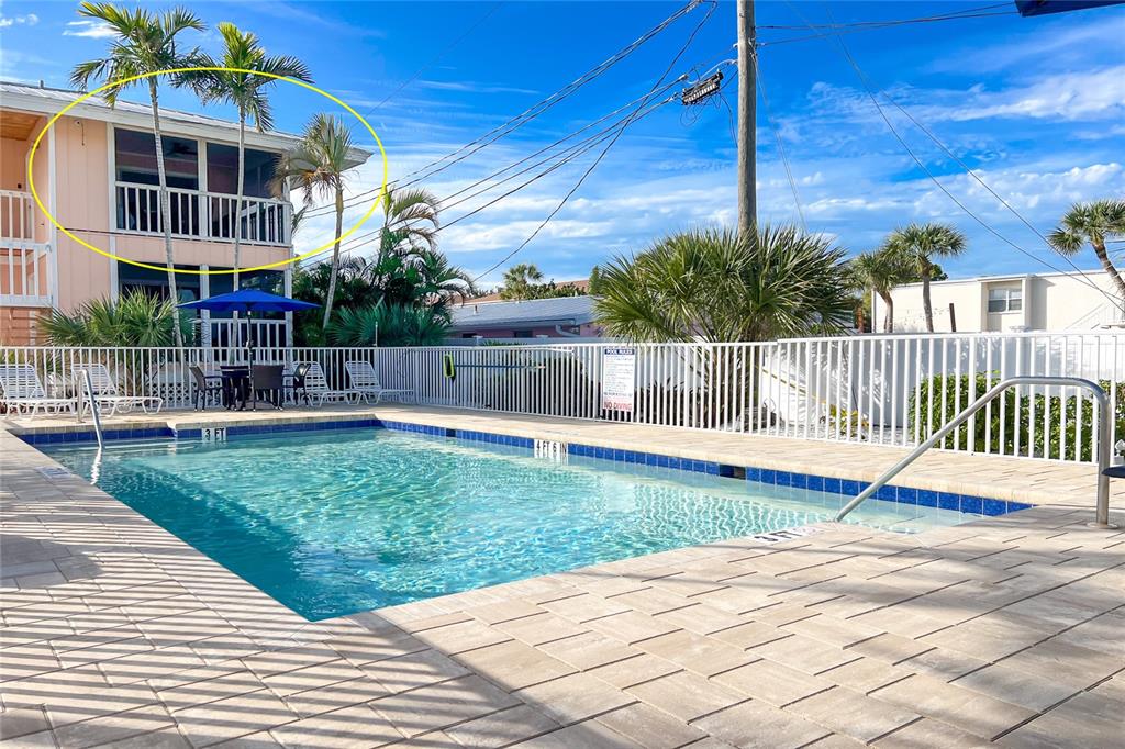 2375 North Beach Road, Unit 2B Englewood, FL 34223 - Photo 33 of 44 a view of a patio with a yard
