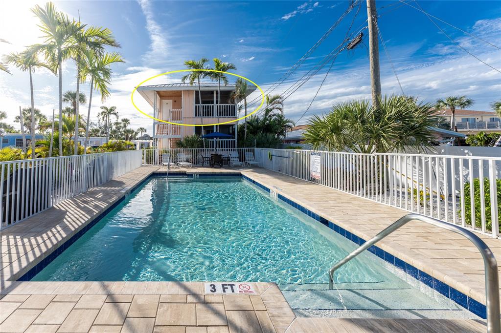 2375 North Beach Road, Unit 2B Englewood, FL 34223 - Photo 34 of 44 a view of a house with a yard