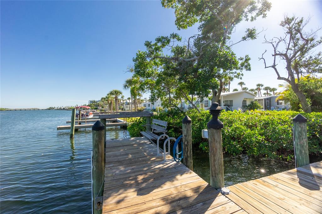 2375 North Beach Road, Unit 2B Englewood, FL 34223 - Photo 40 of 44 a view of a balcony with chairs