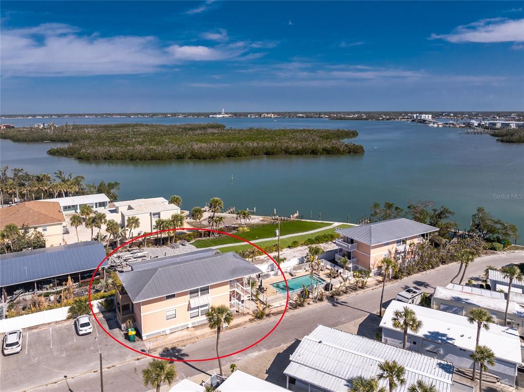2375 North Beach Road, Unit 2B Englewood, FL 34223 - Photo 43 of 44 an aerial view of a houses with outdoor space