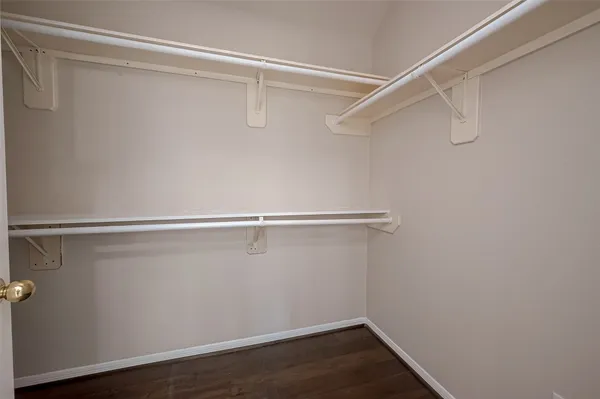a view of an empty walk in closet