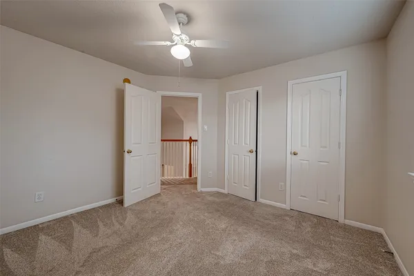 an empty room with a bathroom