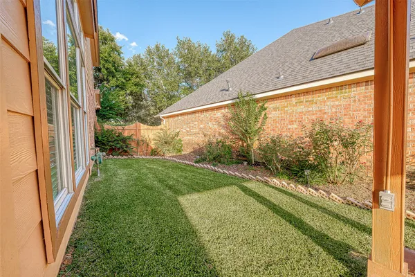 a view of a balcony with garden