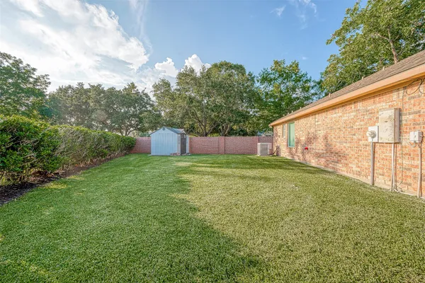 a view of a backyard with garden