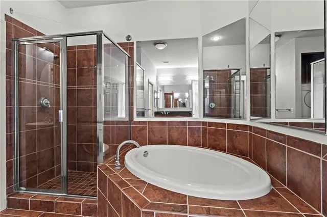 a bathroom with a bathtub and a sink