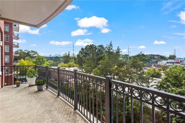 a view of a balcony with city view