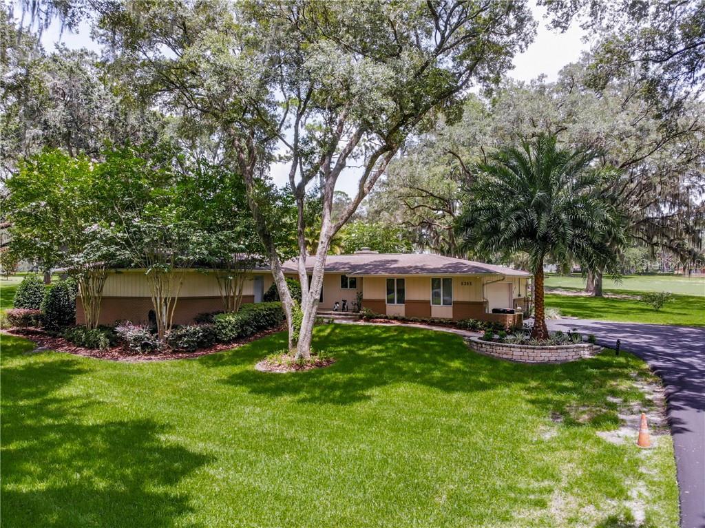5385 Northwest 80th Ave Road Ocala, FL 34482 - Photo 1 of 1 a view of a house with a yard porch and sitting area