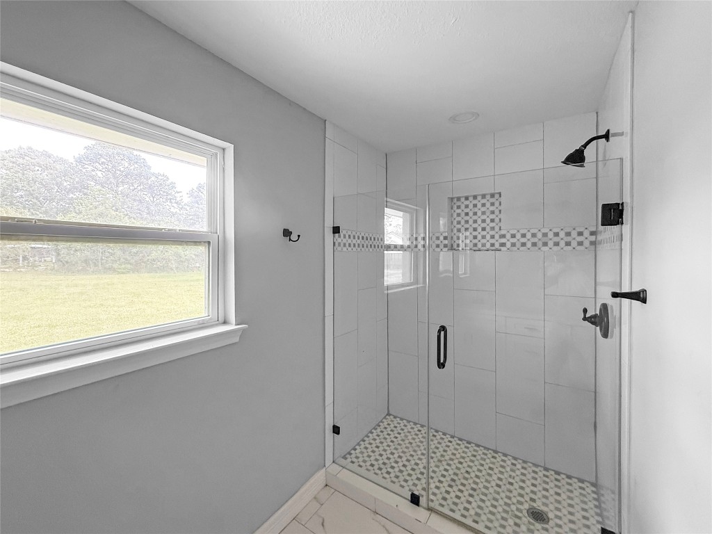 3706 Roberts Boulevard Baytown, TX 77521 - Photo 18 of 22 a bathroom with a shower