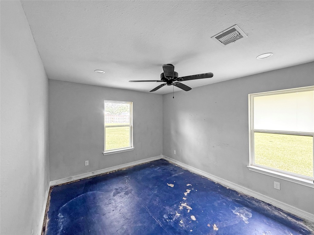 3706 Roberts Boulevard Baytown, TX 77521 - Photo 19 of 22 wooden floor in an empty room with a window
