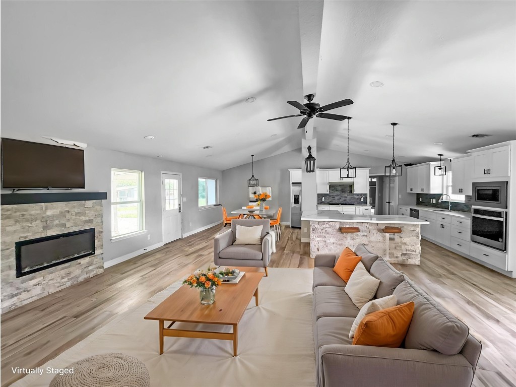 3706 Roberts Boulevard Baytown, TX 77521 - Photo 2 of 22 a living room with furniture and a fireplace
