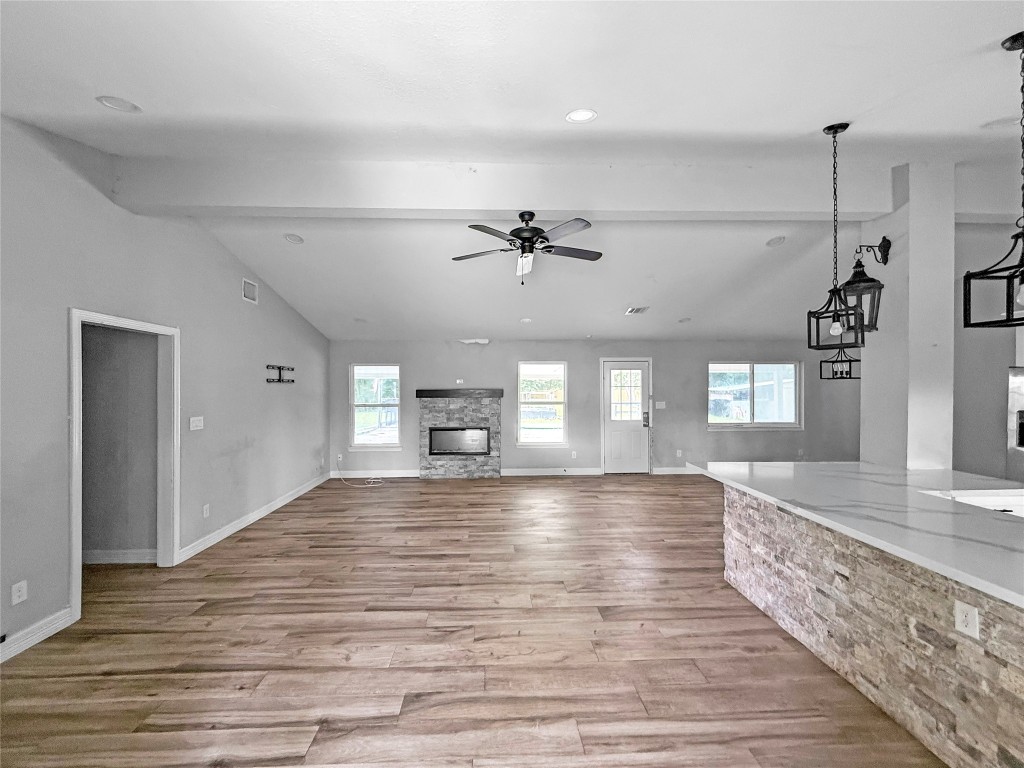 3706 Roberts Boulevard Baytown, TX 77521 - Photo 8 of 22 a view of a kitchen with a sink and wooden floor