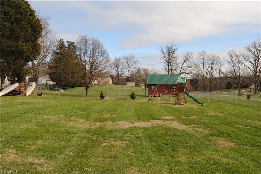 3624 Old Mountain Road Trinity, NC 27370 - Photo 15 of 15 Back yard has been fenced in with separate area for dogs to run. Storage building remains. Great yard for the children to play