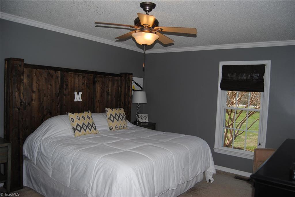 3624 Old Mountain Road Trinity, NC 27370 - Photo 3 of 15 large master bedroom with neutral colors perfect for the KING/Queen of the castle