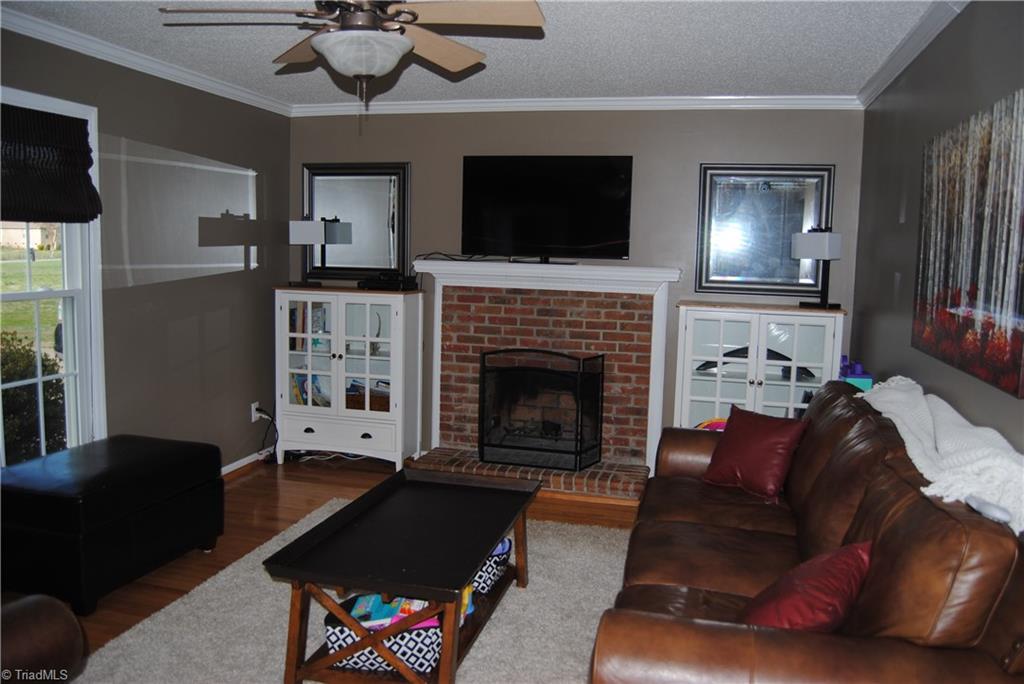 3624 Old Mountain Road Trinity, NC 27370 - Photo 9 of 15 Brick wood burning fireplace in living room