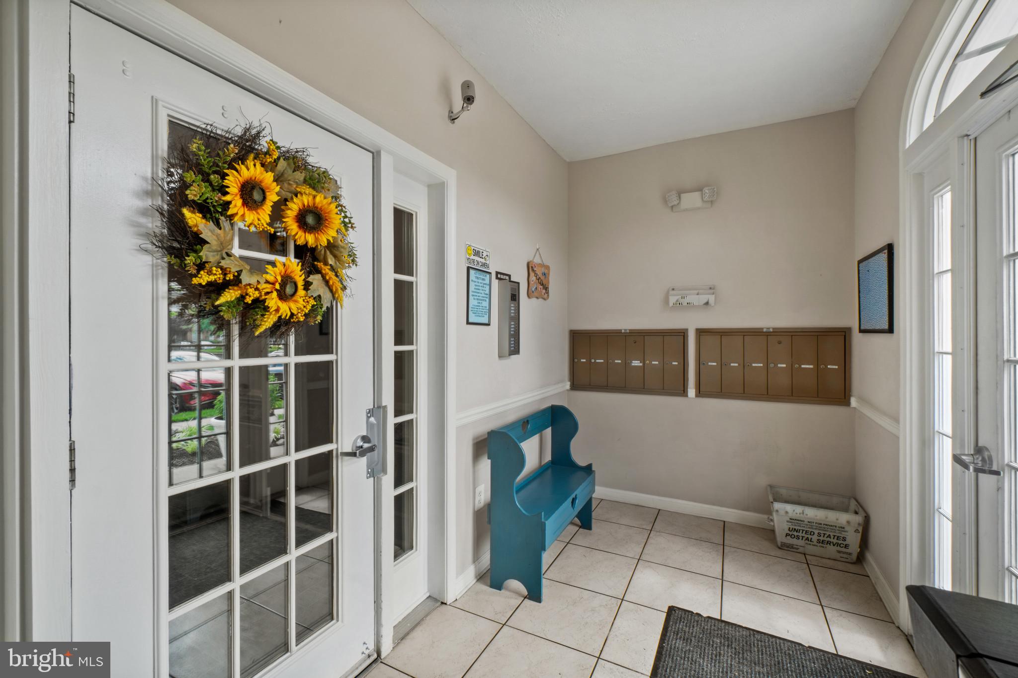 5144 Brightleaf Court, Unit 5144 Rosedale, MD 21237 - Photo 29 of 35 Welcoming entry with sunny decor.