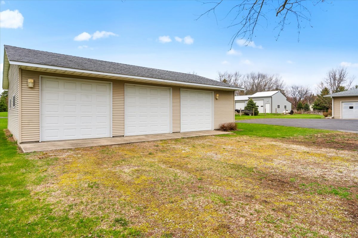 7112 Altenburg Road Harvard, IL 60033 - Photo 2 of 26 a house with a outdoor space
