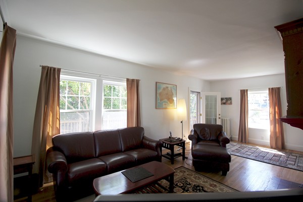 41 Katherine Road Watertown, MA 02472 - Photo 2 of 10 a living room with furniture and a window