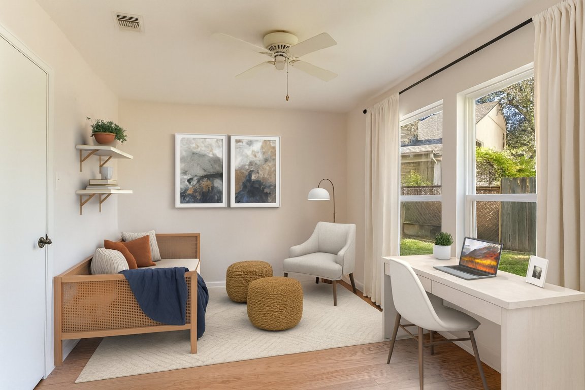 8151 Meandering Way Austin, TX 78759 - Photo 14 of 23 a living room with furniture and a large window