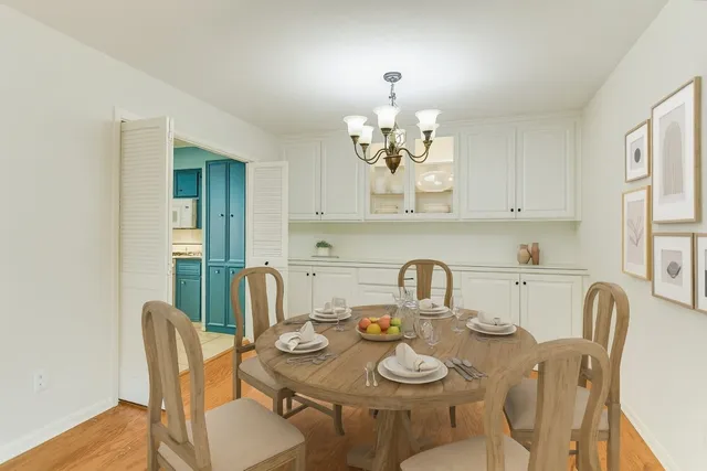 a kitchen with stainless steel appliances a refrigerator and a stove top oven