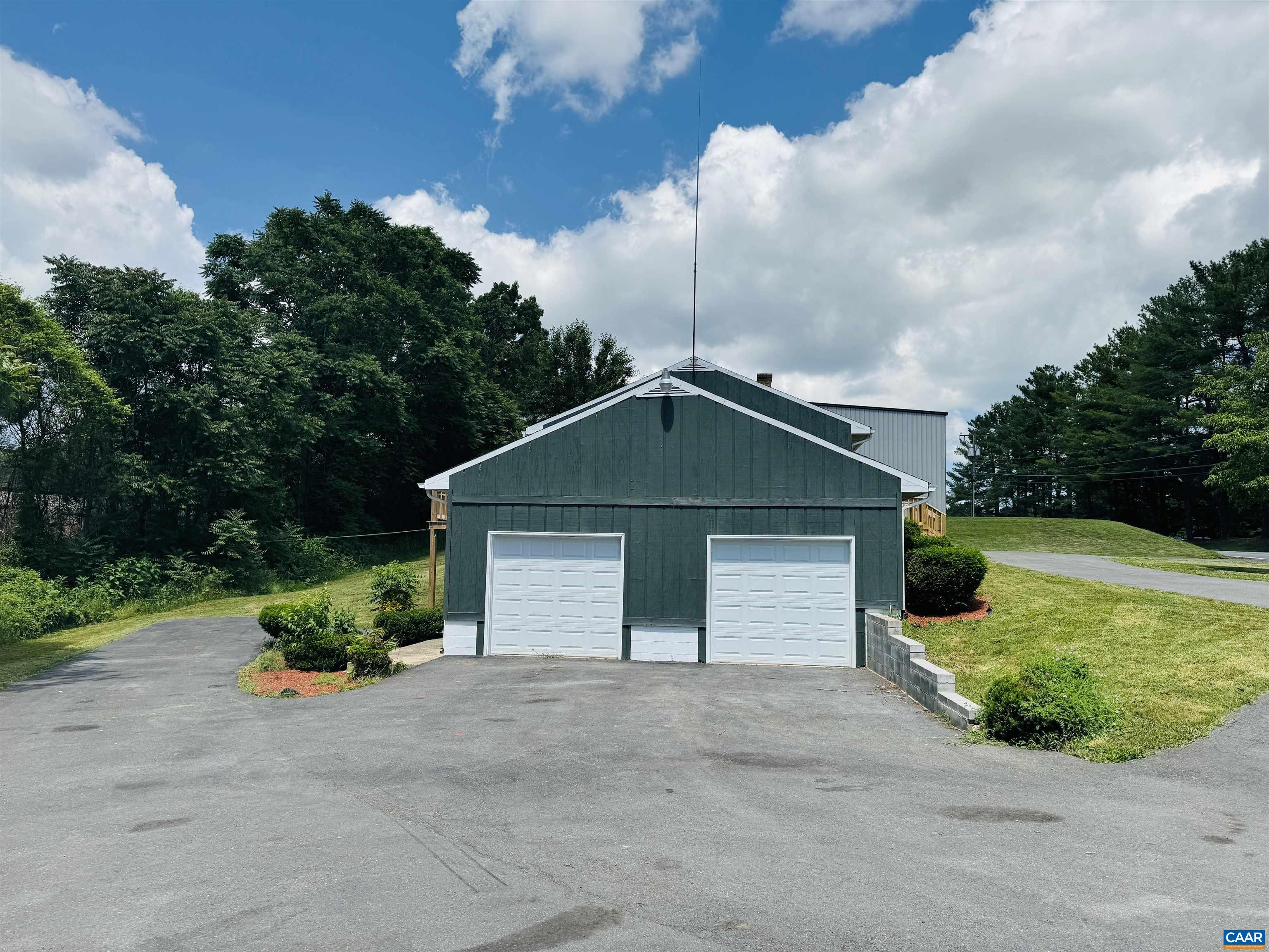 5000 White Bridge Road Waynesboro, VA 22980 - Photo 11 of 74 a front view of a house with garden