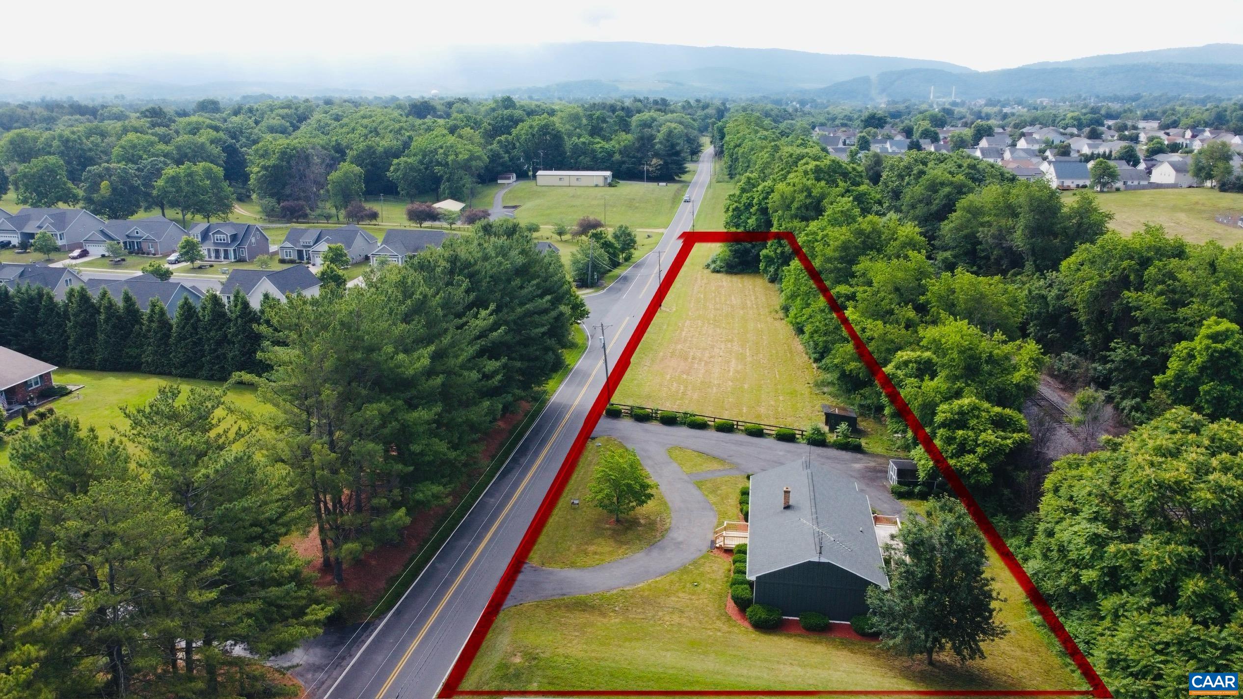 5000 White Bridge Road Waynesboro, VA 22980 - Photo 3 of 74 a aerial view of a house with a yard and lake view