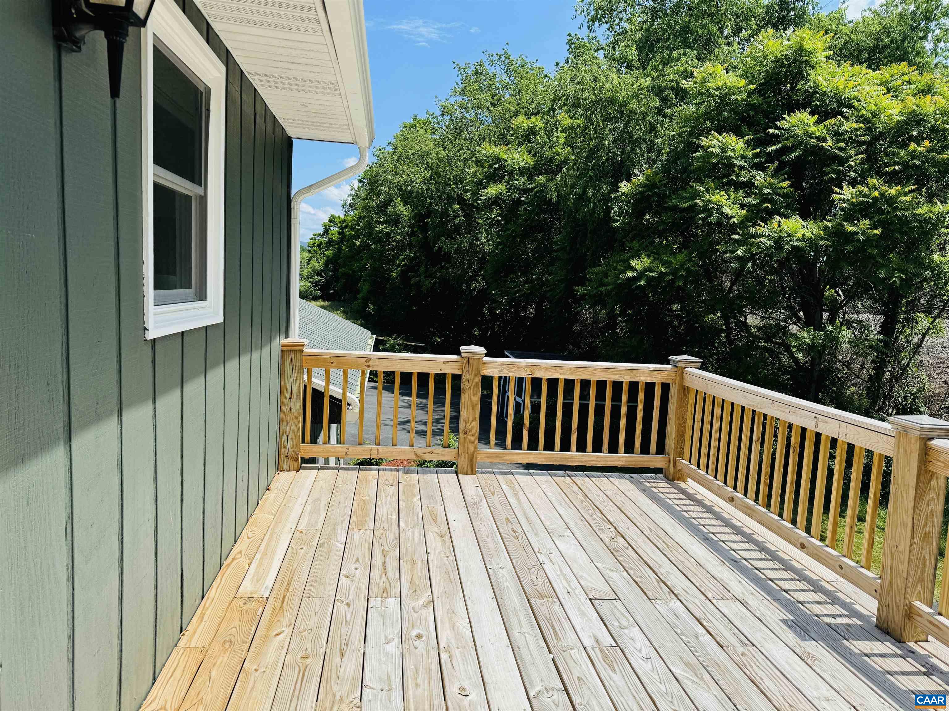 5000 White Bridge Road Waynesboro, VA 22980 - Photo 33 of 74 a balcony with wooden floor in front of it
