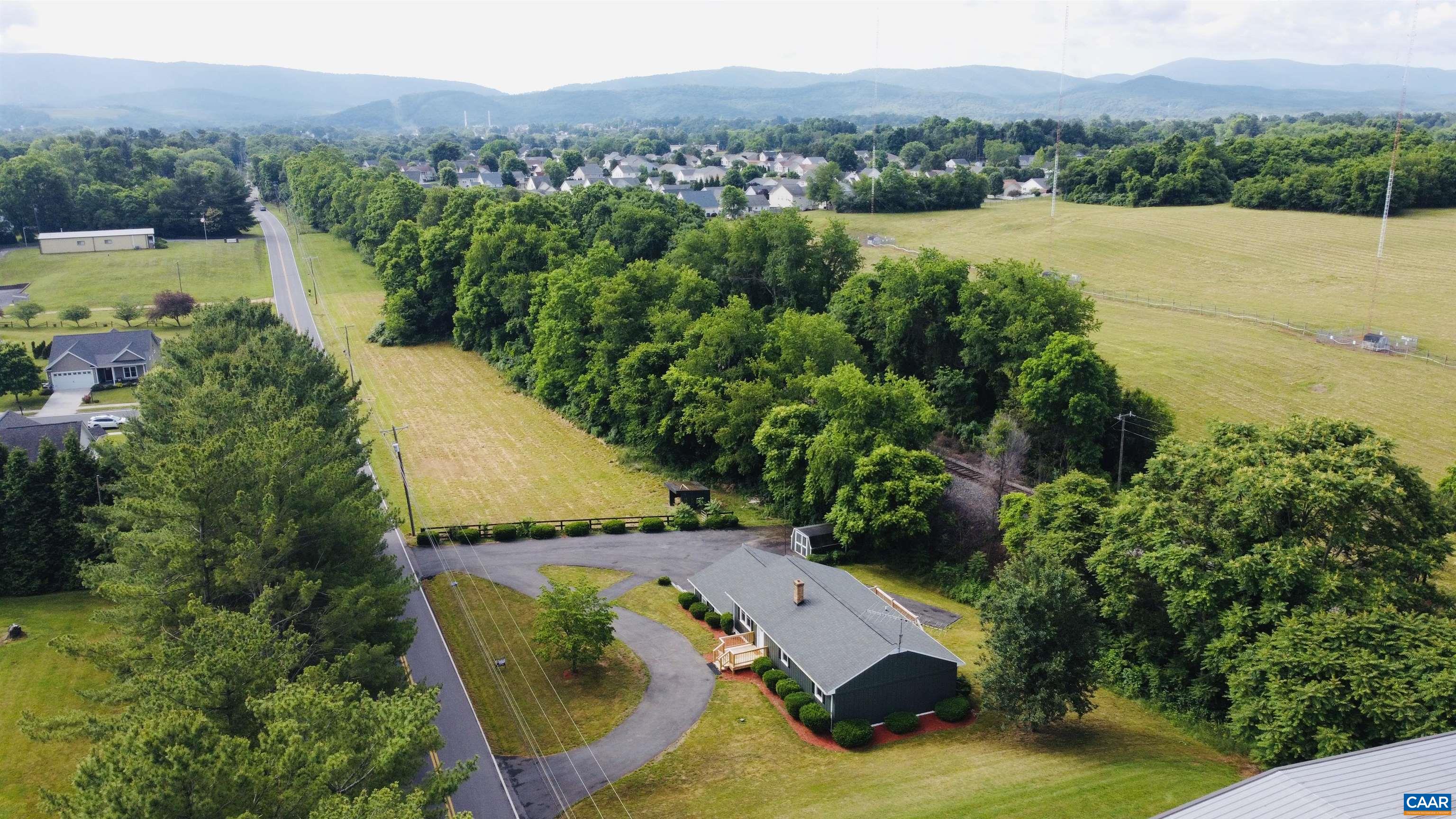 5000 White Bridge Road Waynesboro, VA 22980 - Photo 4 of 74 an aerial view of a house with a garden and a swimming pool