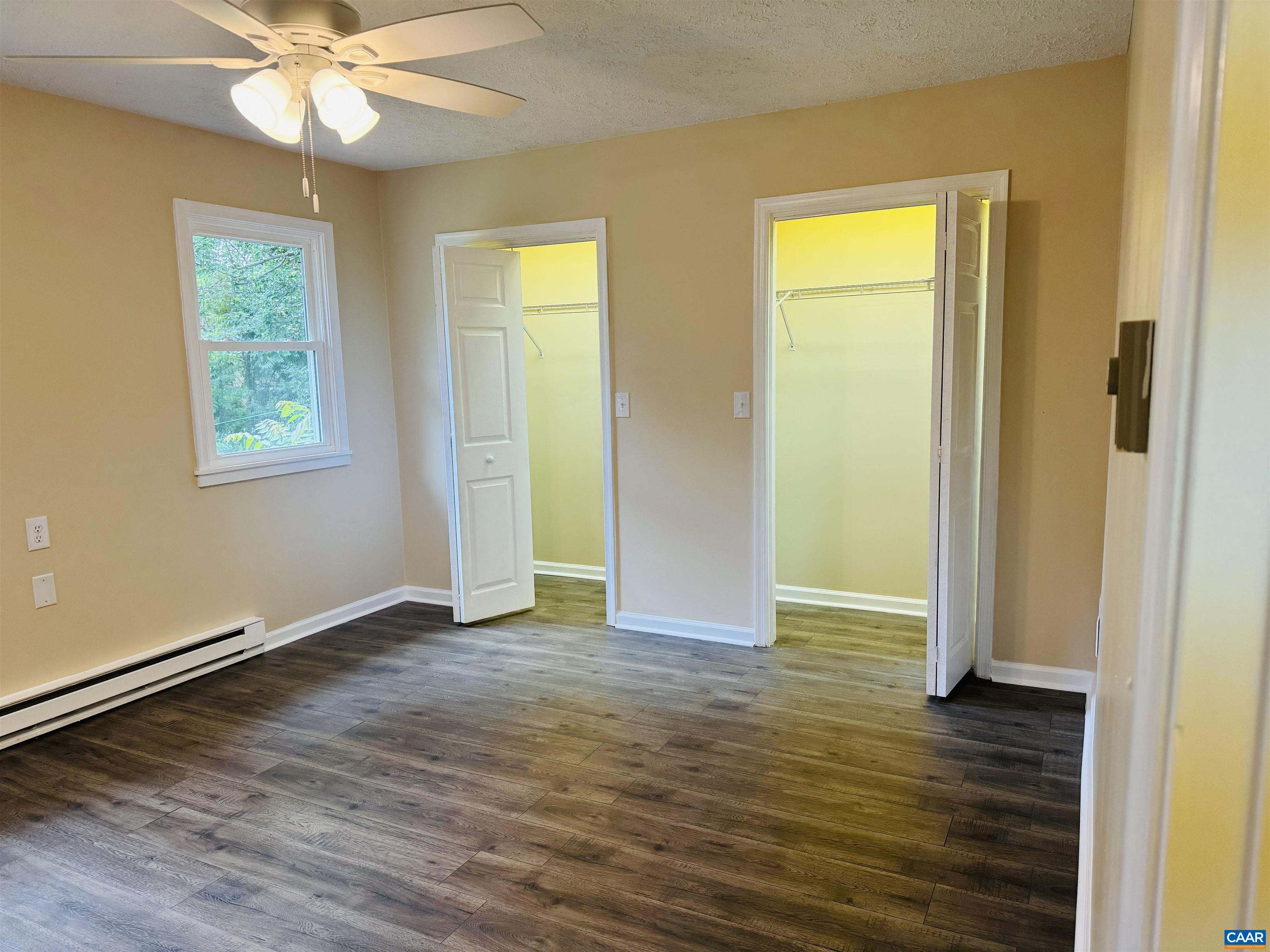 5000 White Bridge Road Waynesboro, VA 22980 - Photo 46 of 74 a view of an empty room with wooden floor and a window