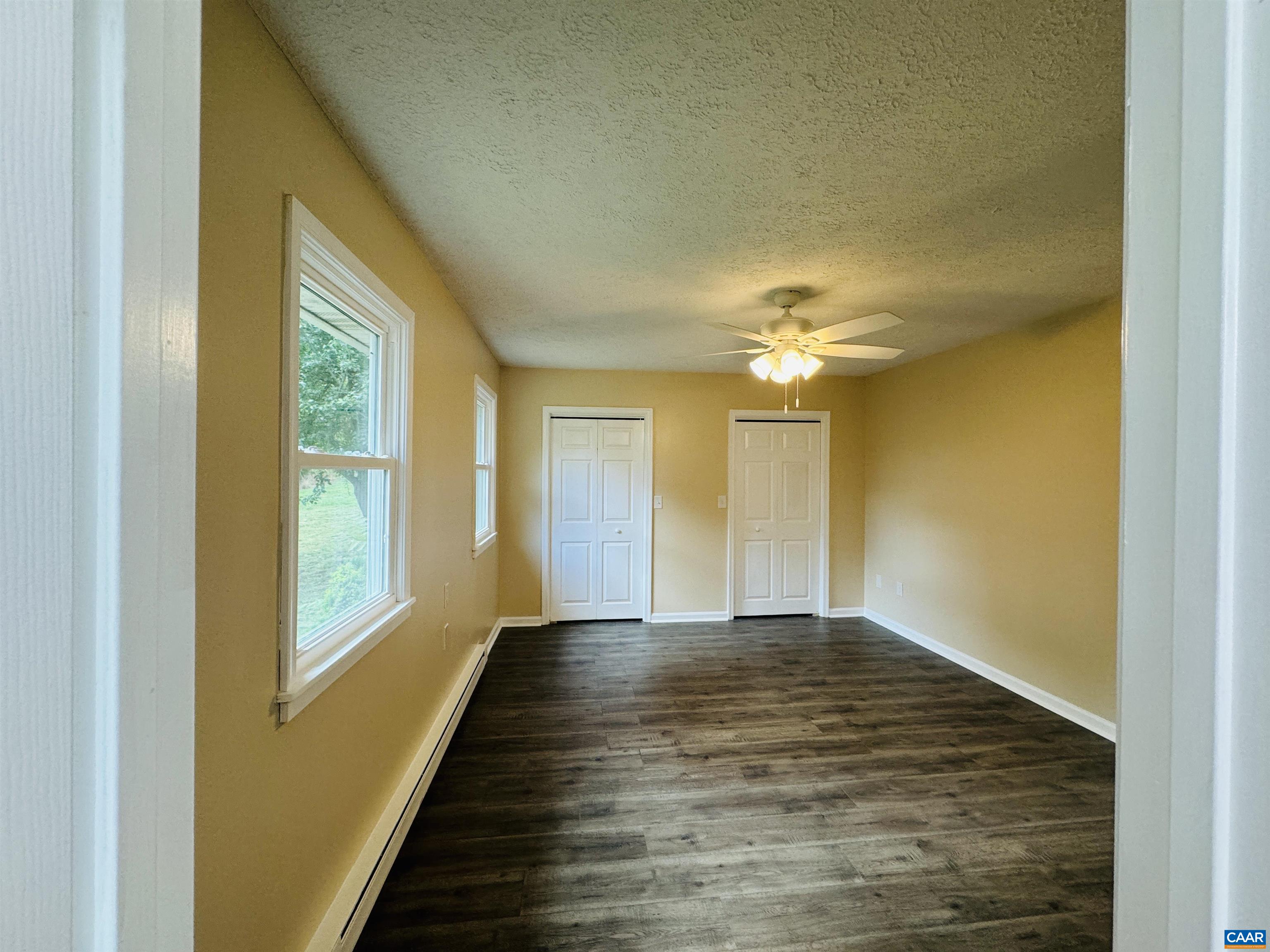 5000 White Bridge Road Waynesboro, VA 22980 - Photo 48 of 74 a view of empty room with wooden floor and fan