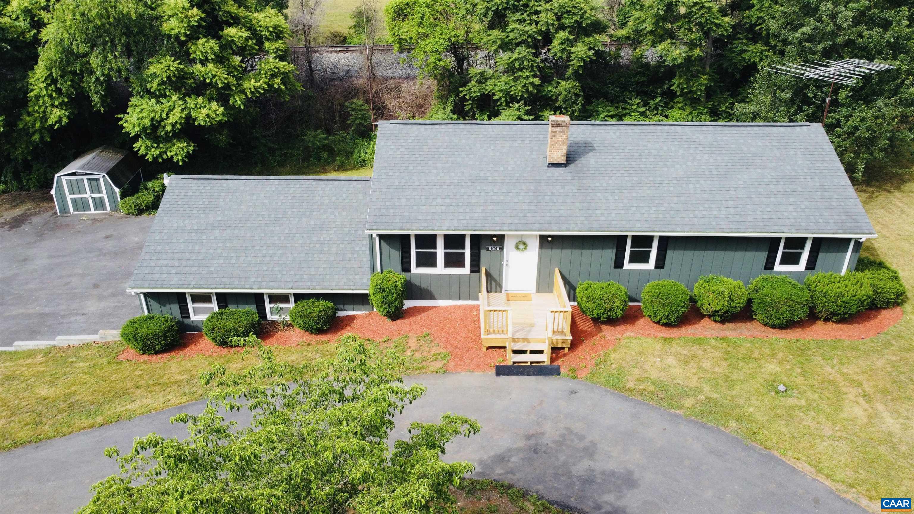 5000 White Bridge Road Waynesboro, VA 22980 - Photo 5 of 74 a front view of a house with yard and green space