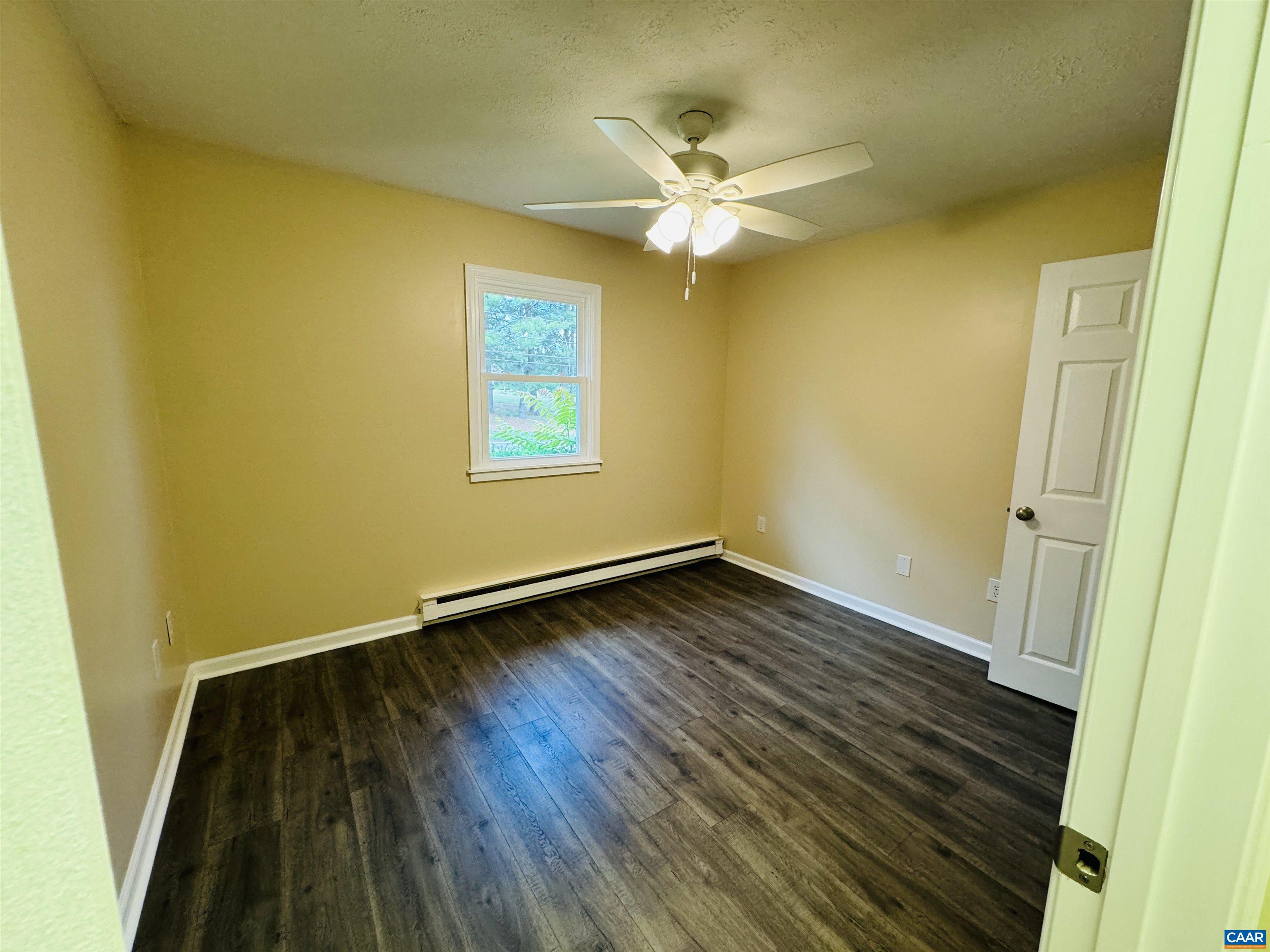 5000 White Bridge Road Waynesboro, VA 22980 - Photo 59 of 74 a view of a room with wooden floor and wall painting