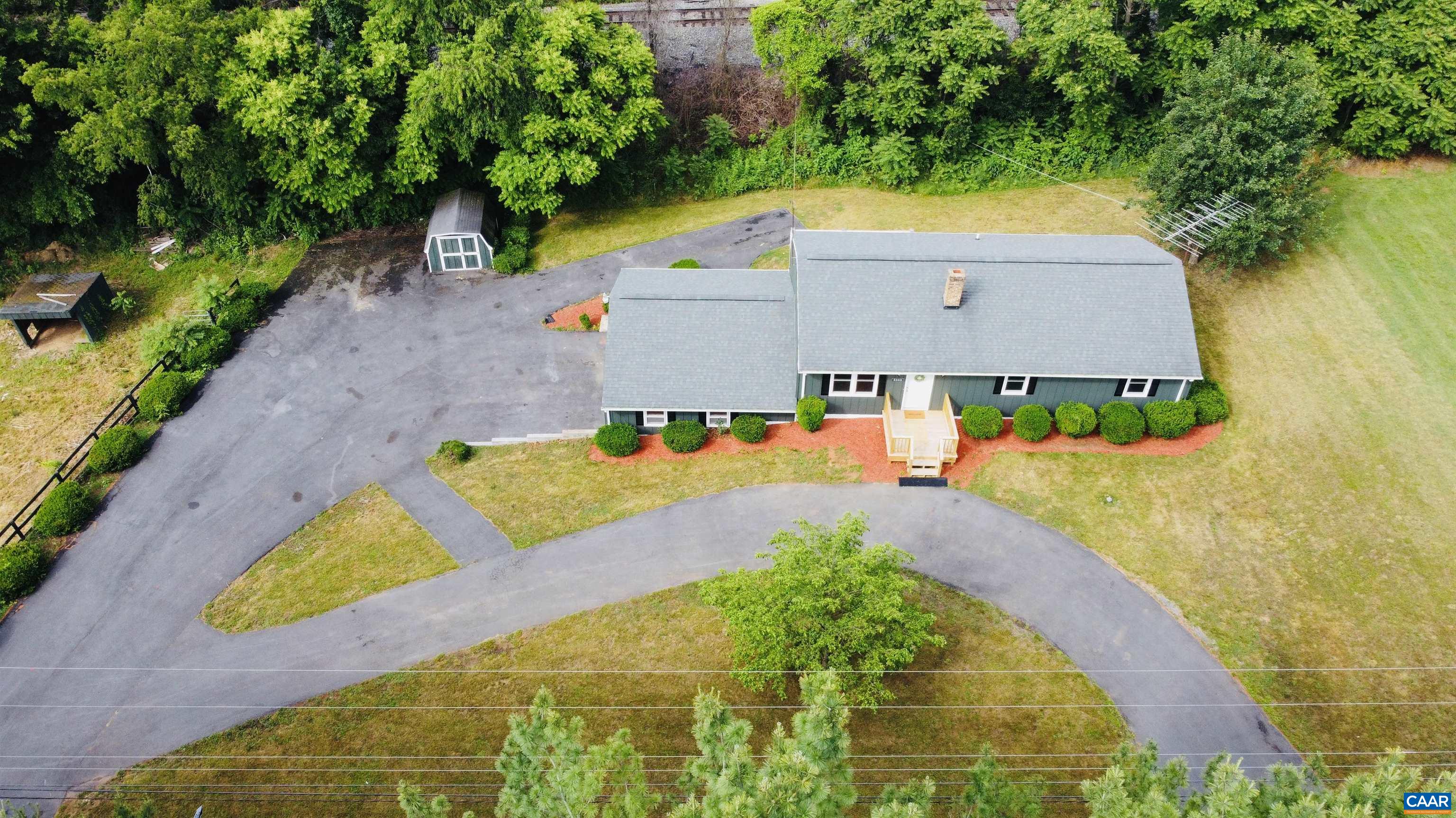 5000 White Bridge Road Waynesboro, VA 22980 - Photo 73 of 74 an aerial view of a house with swimming pool and large trees